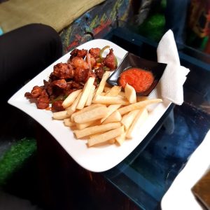 Chicken Wings & yam Chips from Wengeze Pub and Restaurant